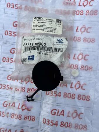 NẮP CHE LỖ MÓC KÉO BA ĐỜ XỐC TRƯỚC 86588N9000 TUCSON CHÍNH HÃNG