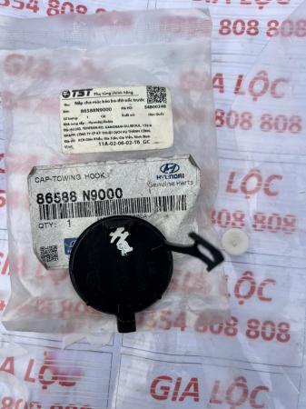 NẮP CHE LỖ MÓC KÉO BA ĐỜ XỐC TRƯỚC 86588N9000 TUCSON CHÍNH HÃNG